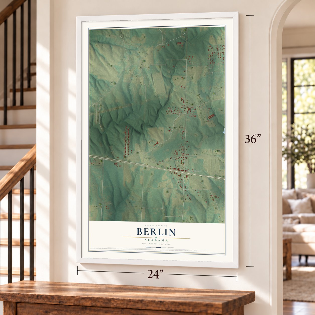 Berlin, Alabama map, 24 x 36 inch print in a white frame by a staircase