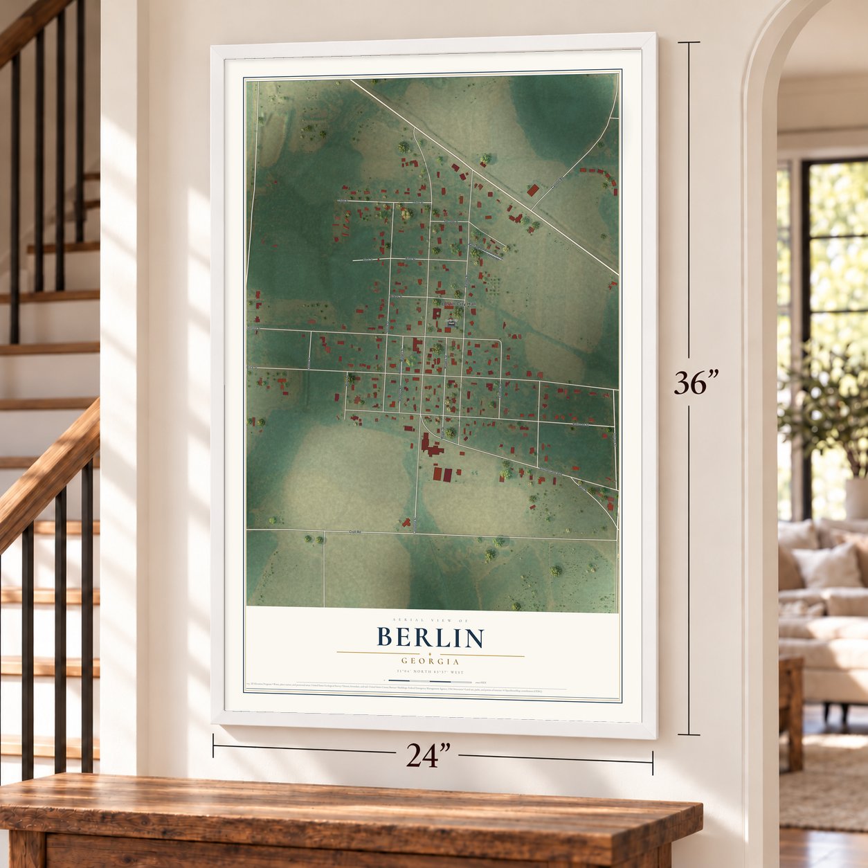 Berlin, Georgia map, 24 x 36 inch print in a white frame by a staircase