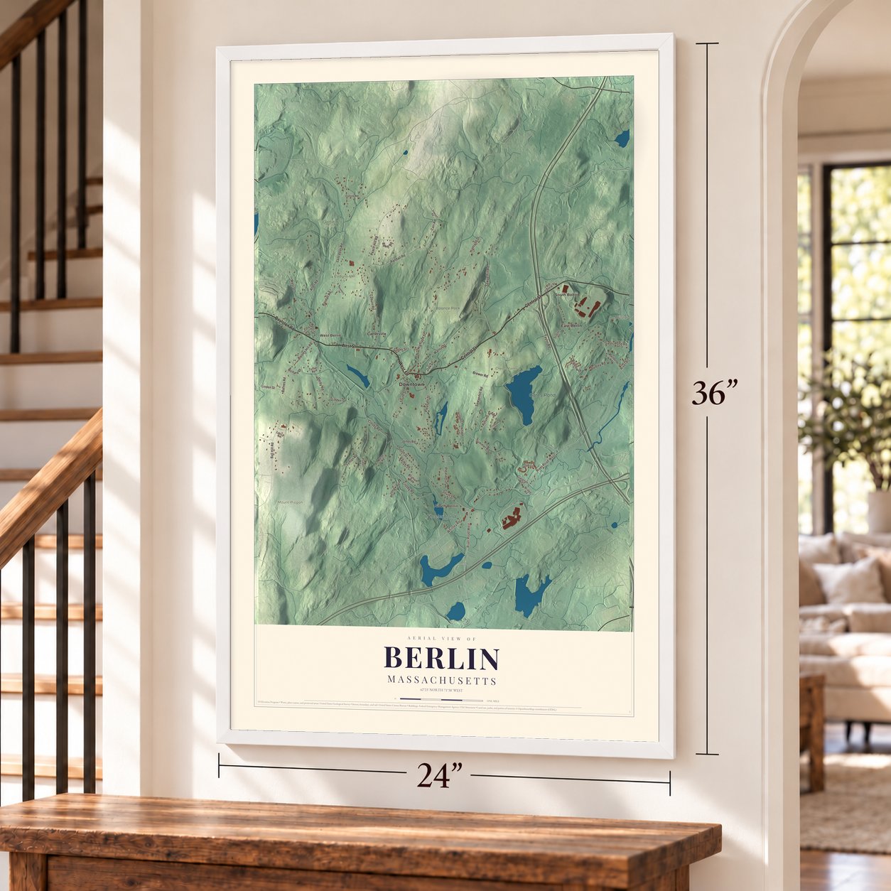 Berlin, Massachusetts map, 24 x 36 inch print in a white frame by a staircase
