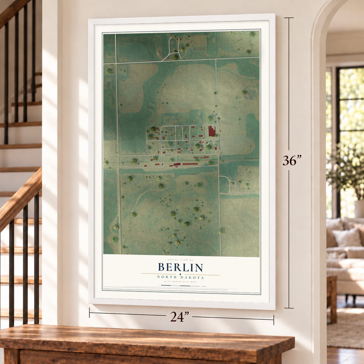 Berlin, North Dakota map, 24 x 36 inch print in a white frame by a staircase