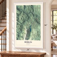 Berlin, Vermont map, 24 x 36 inch print in a white frame by a staircase