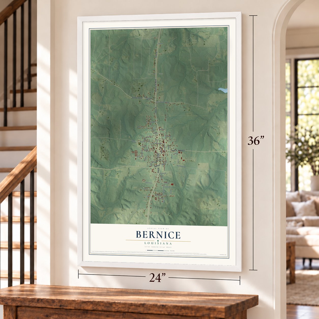 Bernice, Louisiana map, 24 x 36 inch print in a white frame by a staircase