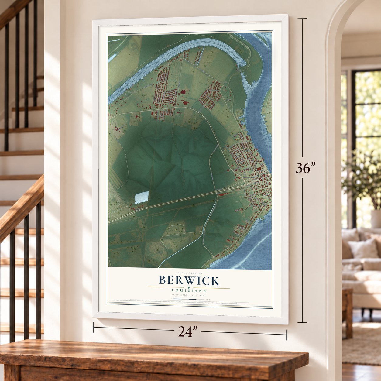 Berwick, Louisiana map, 24 x 36 inch print in a white frame by a staircase