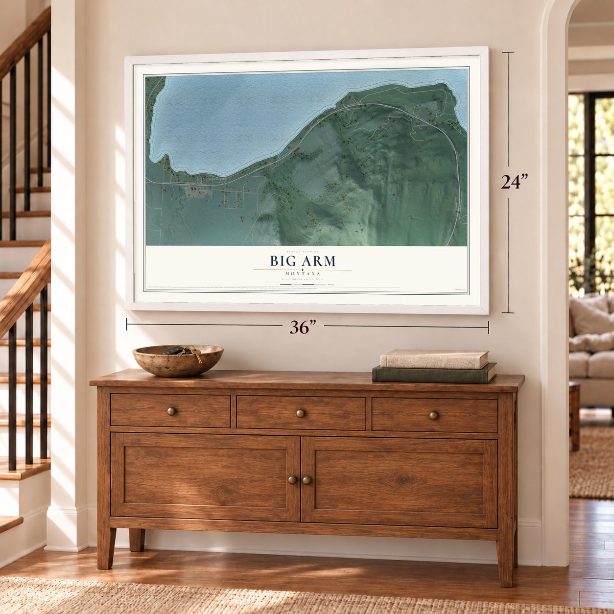 Big Arm, Montana map, 24 x 36 inch print in a white frame above a dresser by a staircase