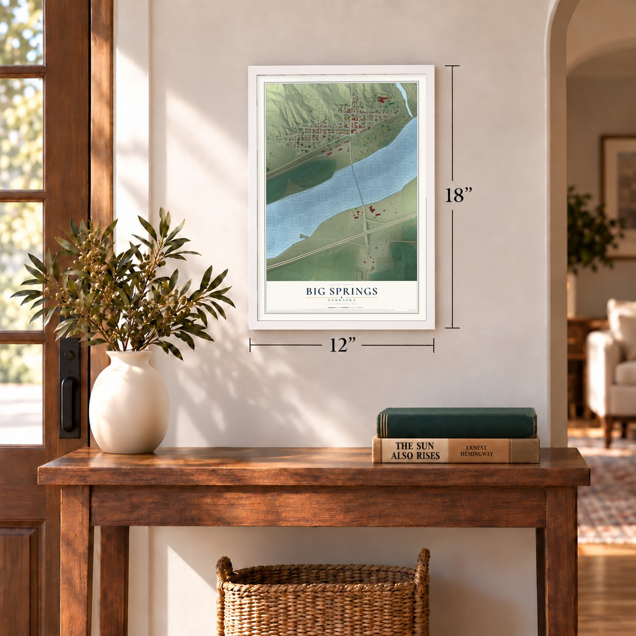 Big Springs, Nebraska map, 12 x 18 inch print in a white frame in an entryway