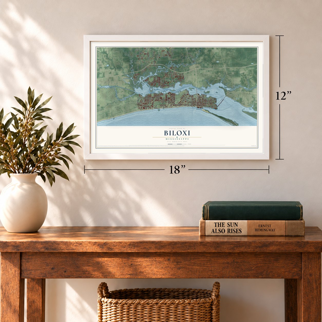 Biloxi, Mississippi map, 12 x 18 inch print in a white frame in an entryway