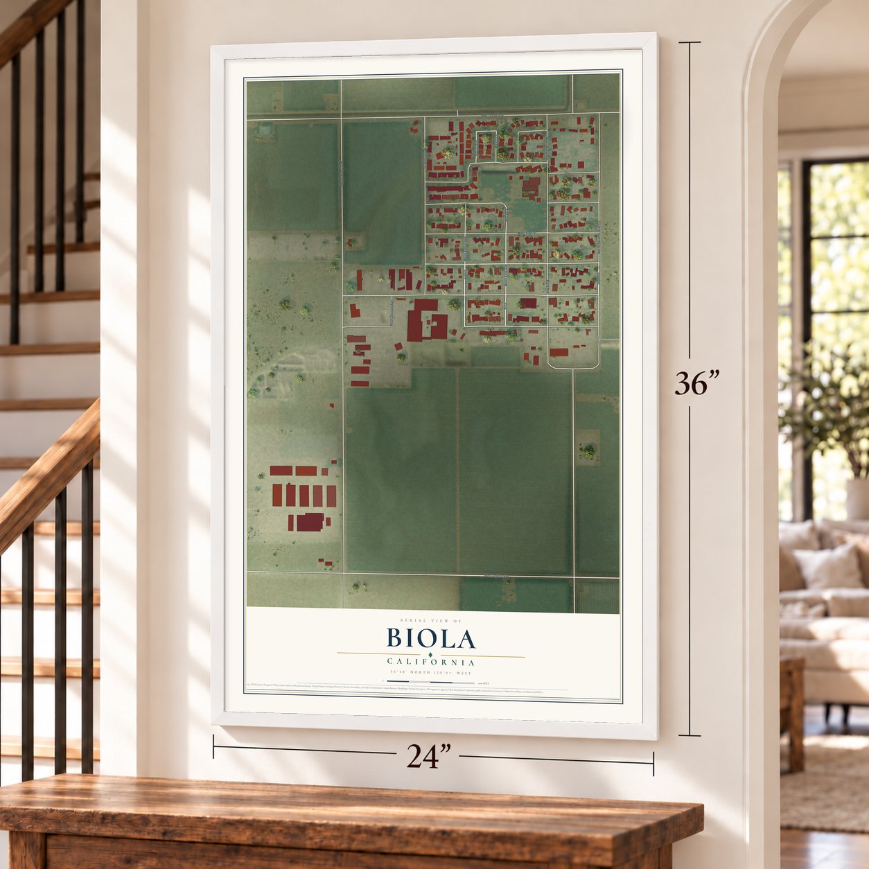 Biola, California map, 24 x 36 inch print in a white frame by a staircase