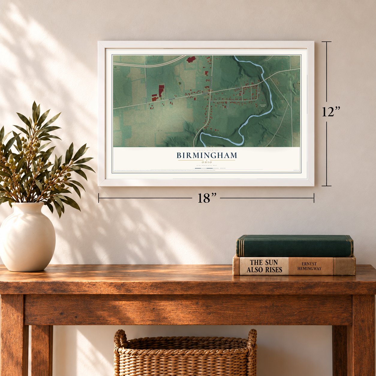 Birmingham, Ohio map, 12 x 18 inch print in a white frame in an entryway