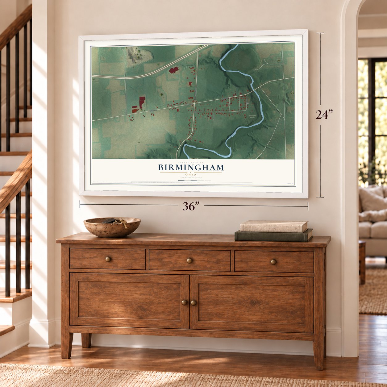 Birmingham, Ohio map, 24 x 36 inch print in a white frame above a dresser by a staircase
