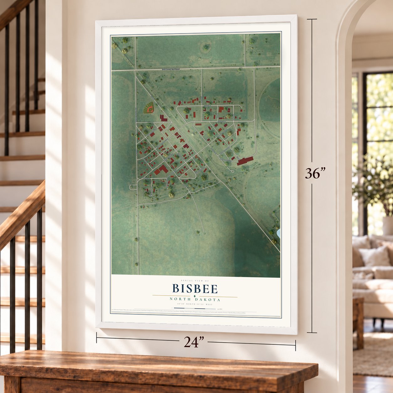 Bisbee, North Dakota map, 24 x 36 inch print in a white frame by a staircase