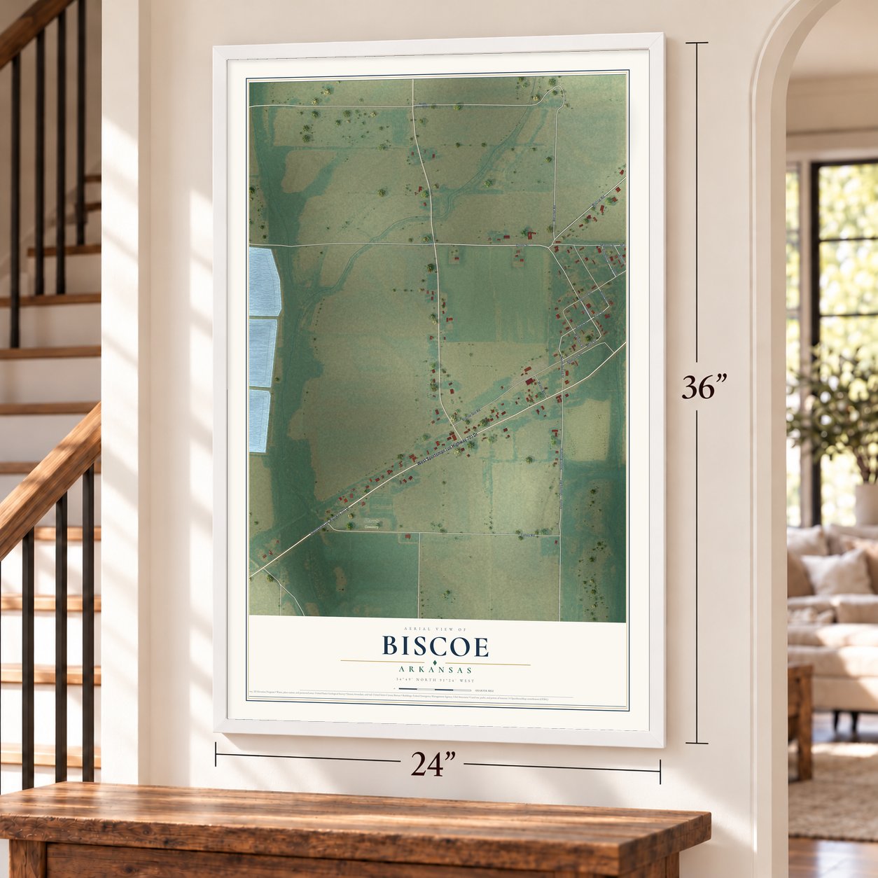 Biscoe, Arkansas map, 24 x 36 inch print in a white frame by a staircase