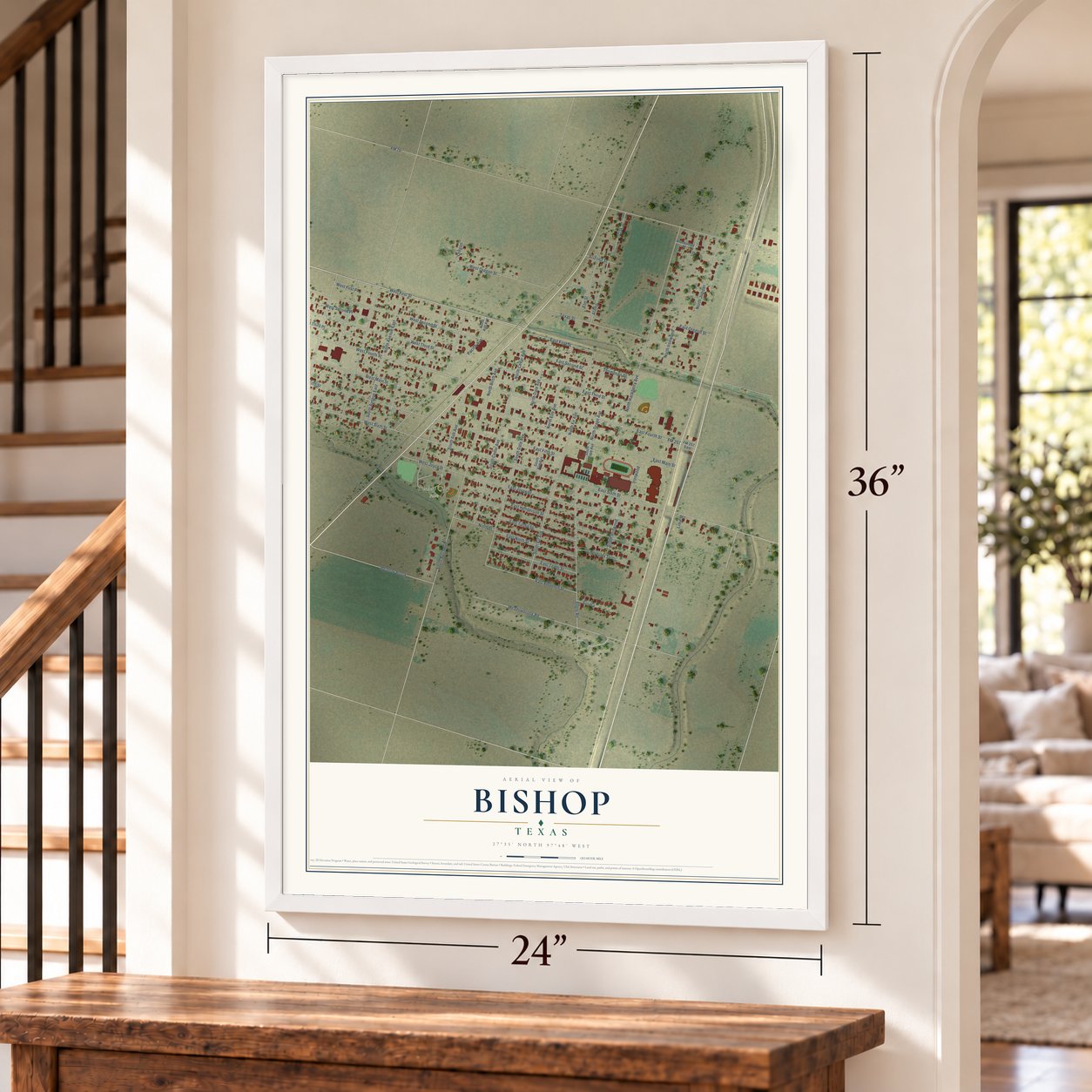 Bishop, Texas map, 24 x 36 inch print in a white frame by a staircase