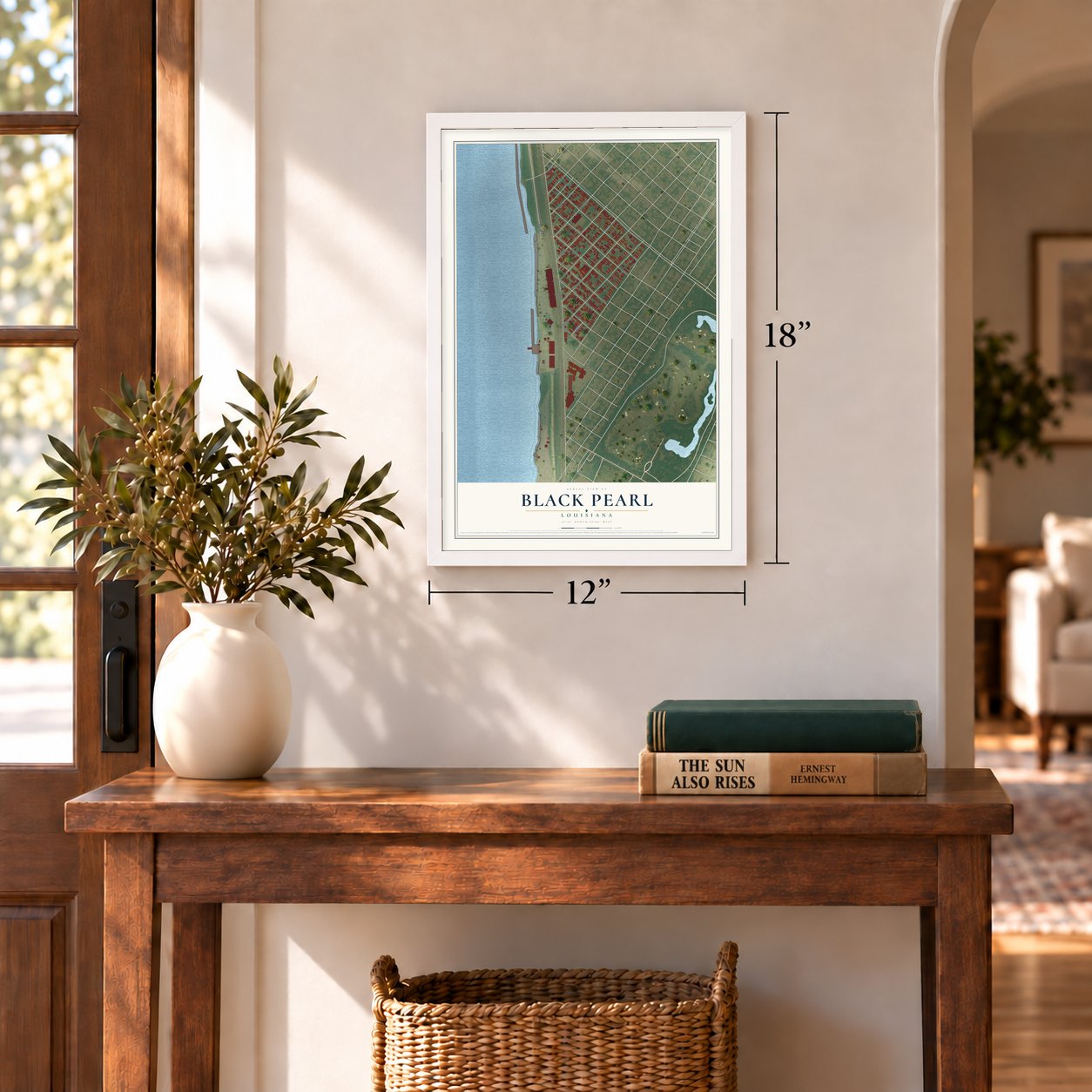 Black Pearl, Louisiana map, 12 x 18 inch print in a white frame in an entryway
