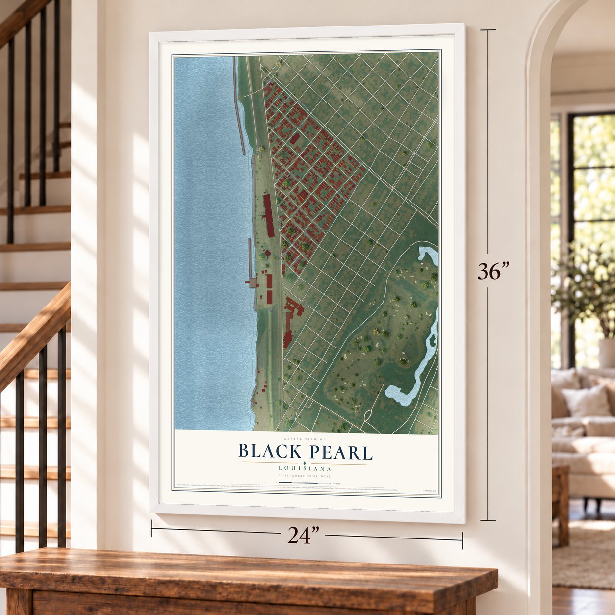 Black Pearl, Louisiana map, 24 x 36 inch print in a white frame by a staircase