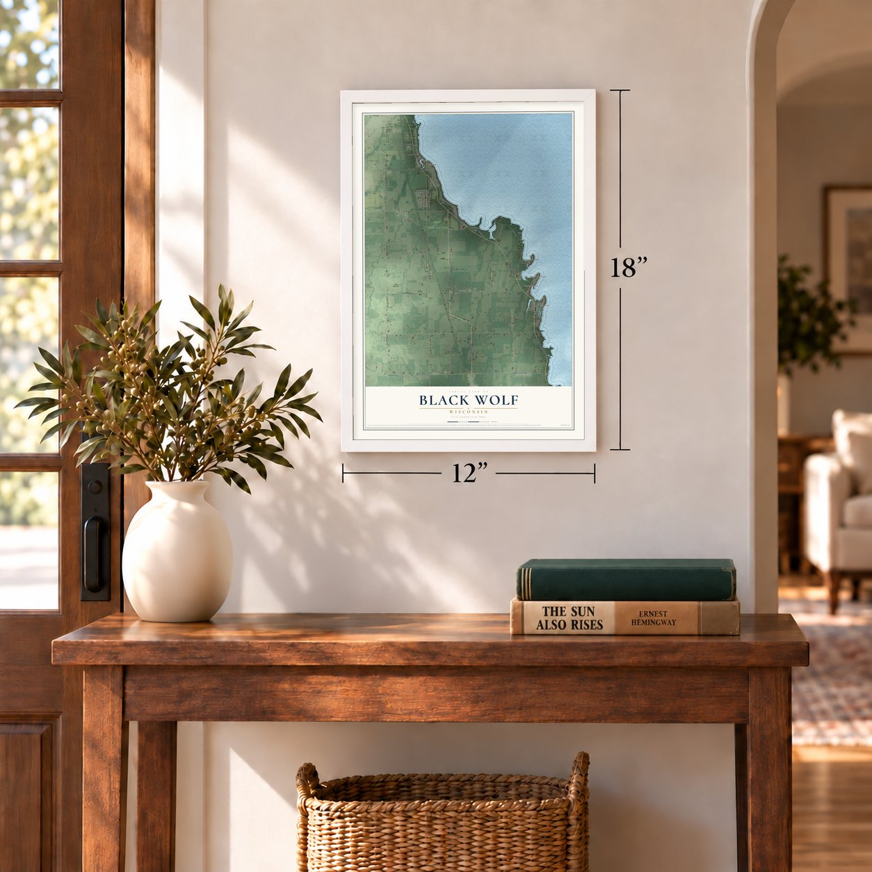 Black Wolf, Wisconsin map, 12 x 18 inch print in a white frame in an entryway
