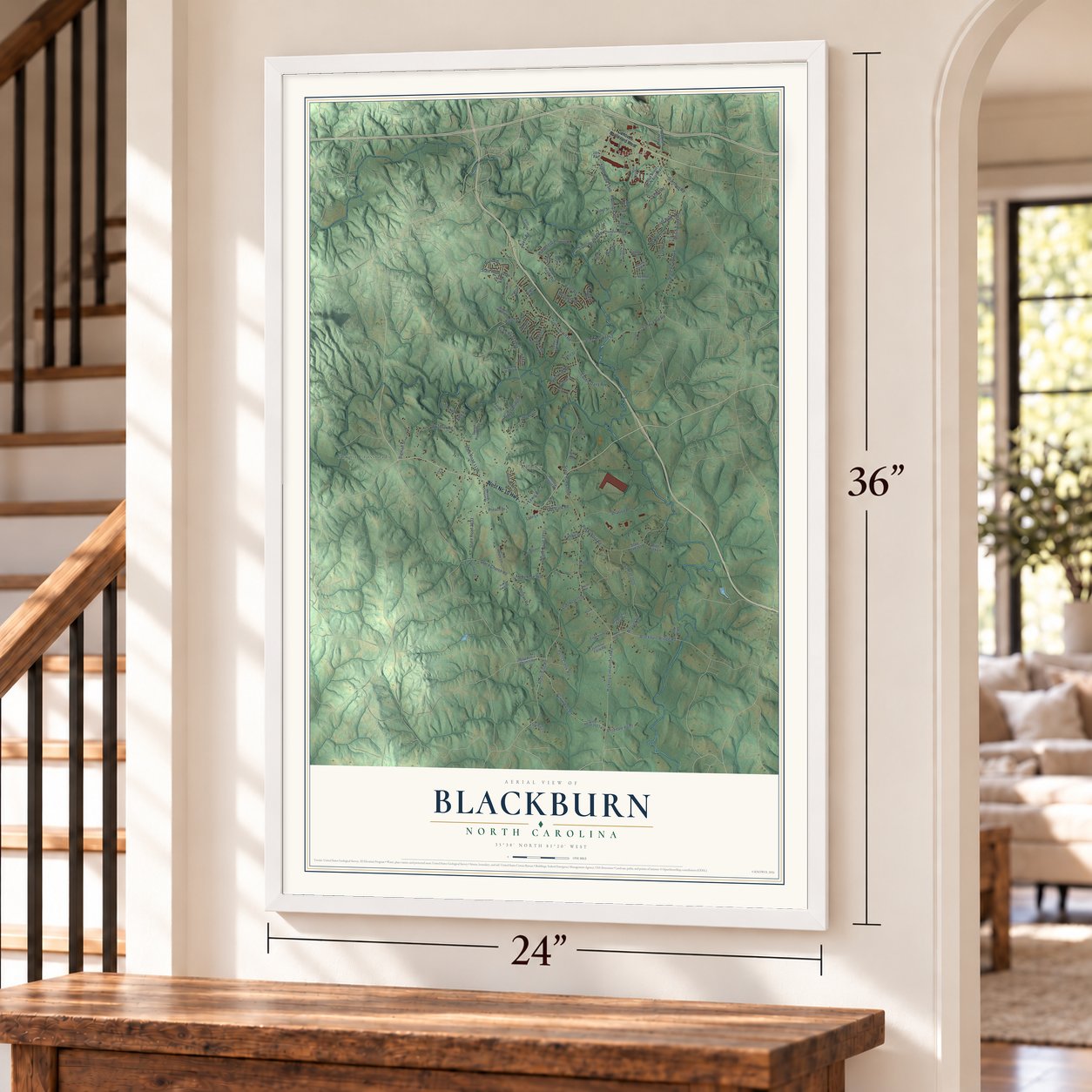 Blackburn, North Carolina map, 24 x 36 inch print in a white frame by a staircase
