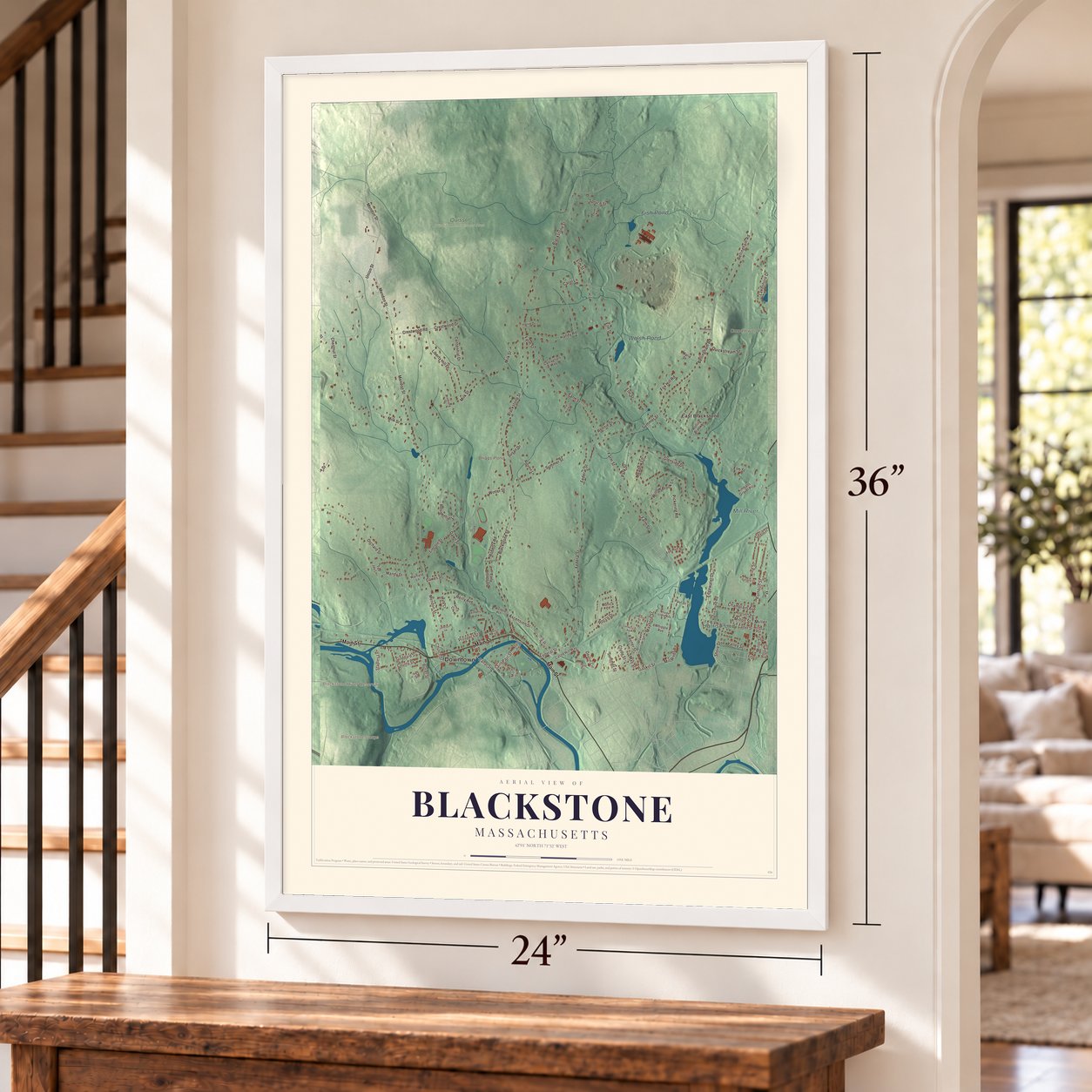 Blackstone, Massachusetts map, 24 x 36 inch print in a white frame by a staircase