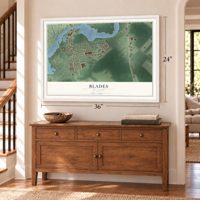 Blades, Delaware map, 24 x 36 inch print in a white frame above a dresser by a staircase