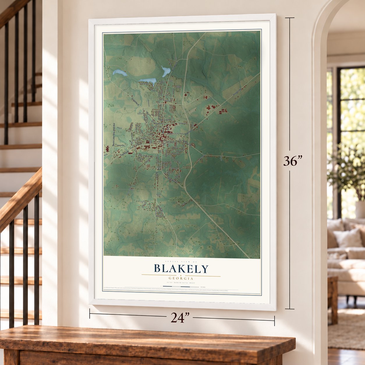 Blakely, Georgia map, 24 x 36 inch print in a white frame by a staircase