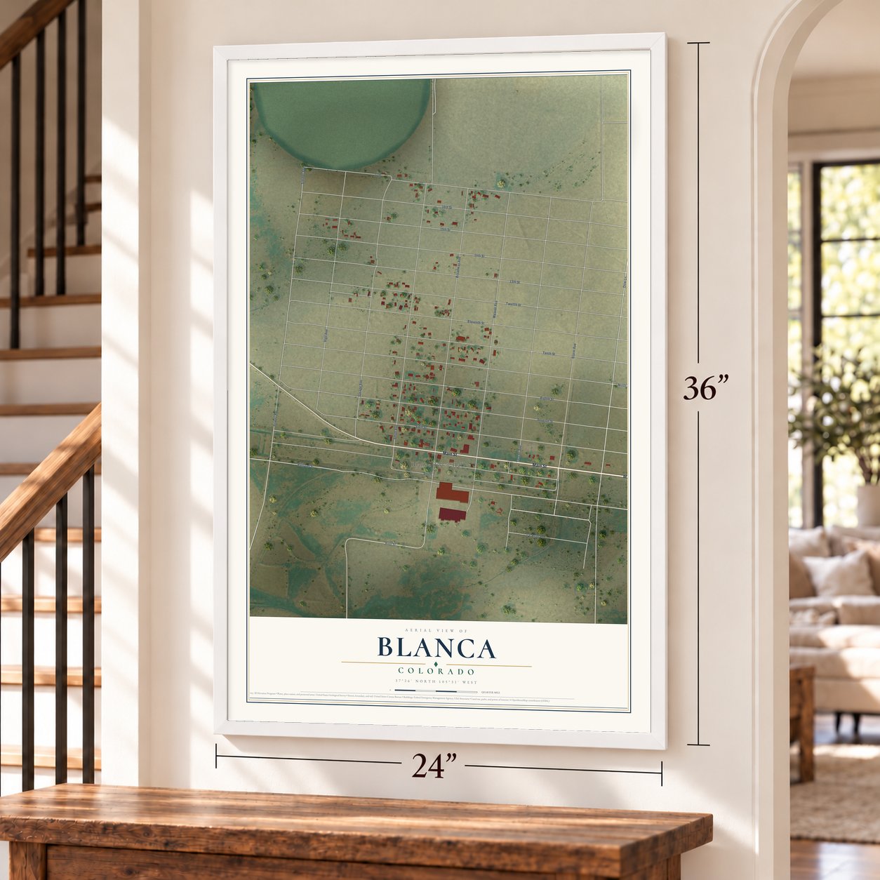 Blanca, Colorado map, 24 x 36 inch print in a white frame by a staircase