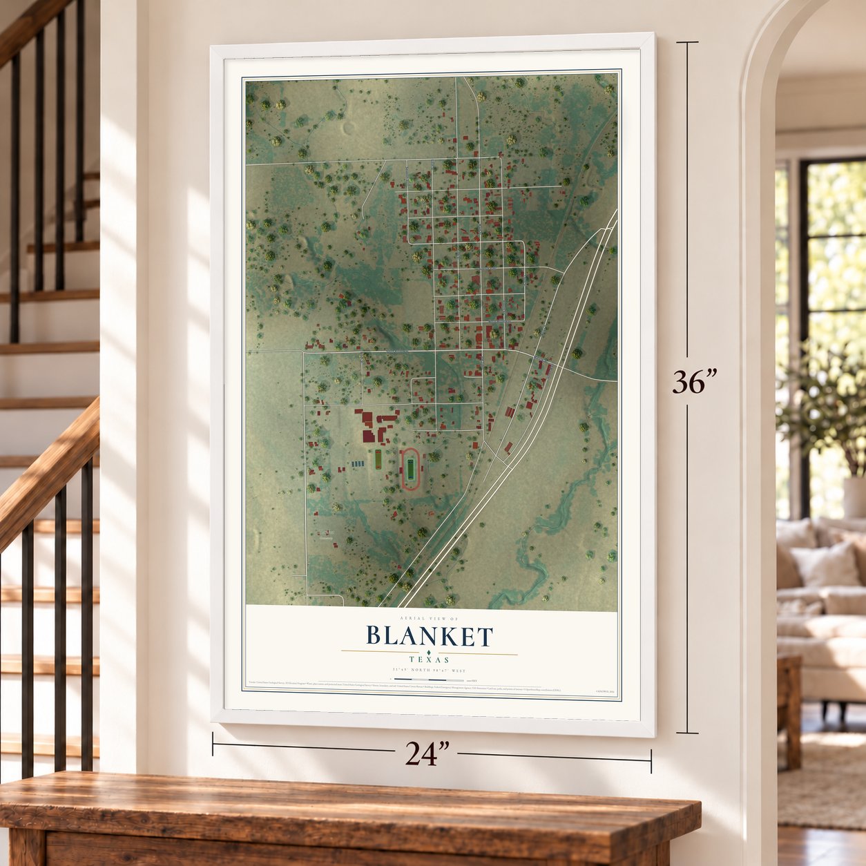 Blanket, Texas map, 24 x 36 inch print in a white frame by a staircase