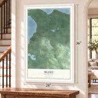 Bliss, Michigan map, 24 x 36 inch print in a white frame by a staircase