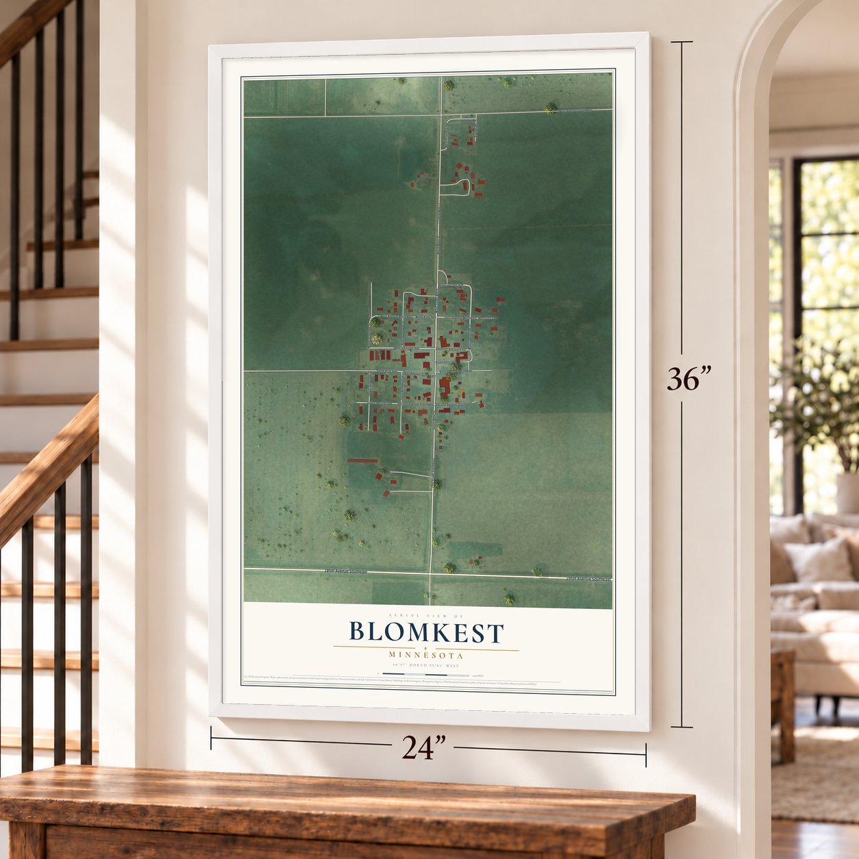 Blomkest, Minnesota map, 24 x 36 inch print in a white frame by a staircase