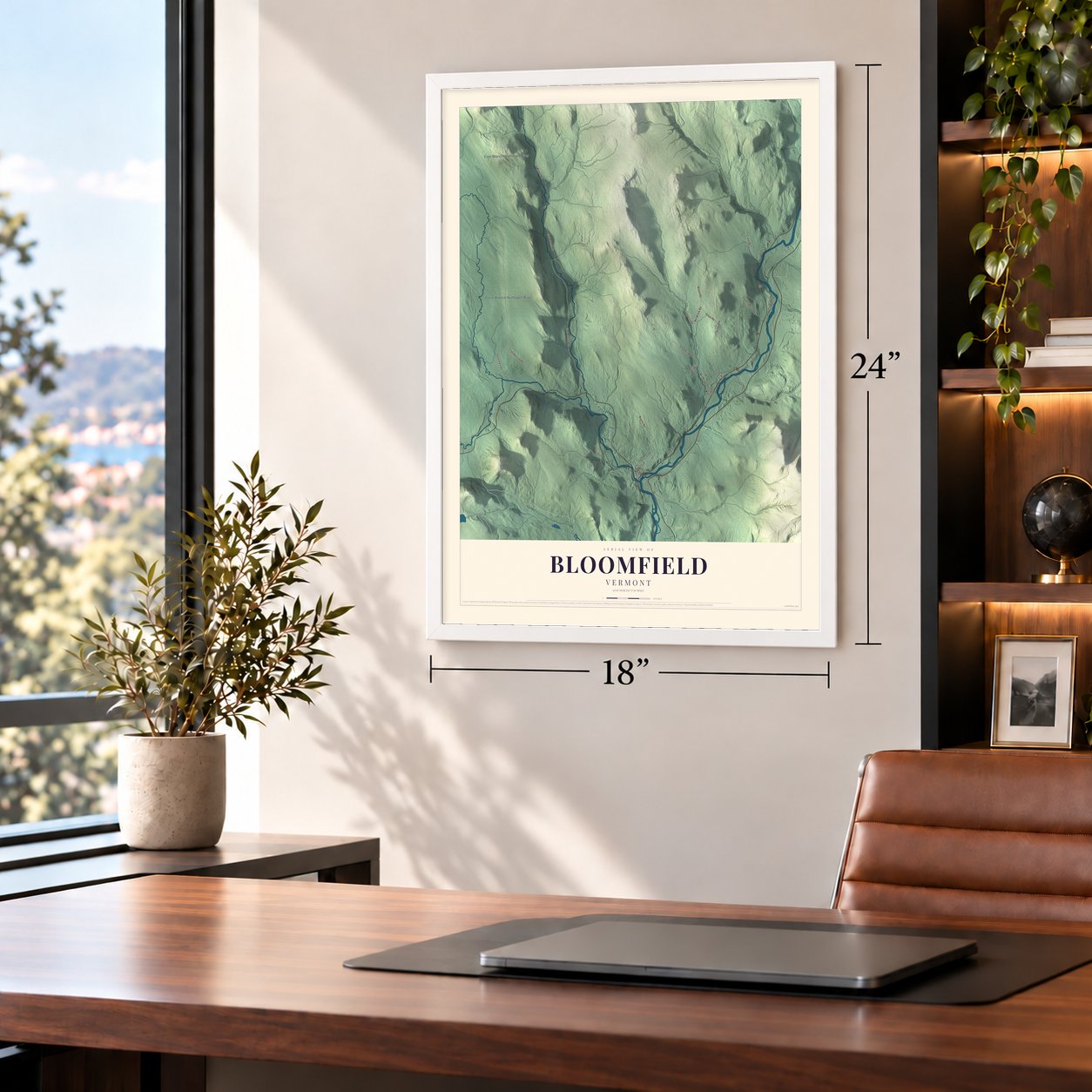 Bloomfield, Vermont map, 18 x 24 inch print in a white frame in a home office