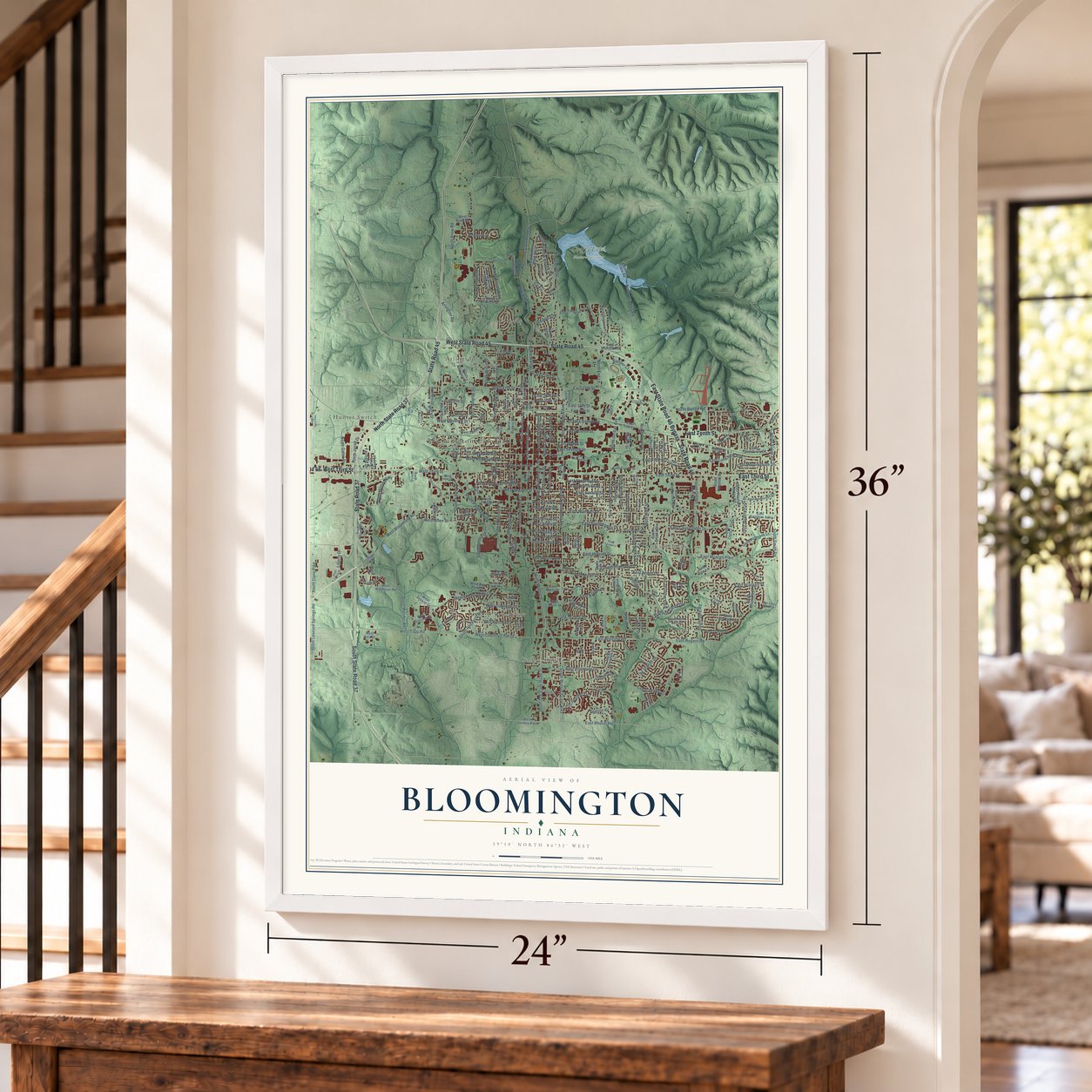 Bloomington, Indiana map, 24 x 36 inch print in a white frame by a staircase