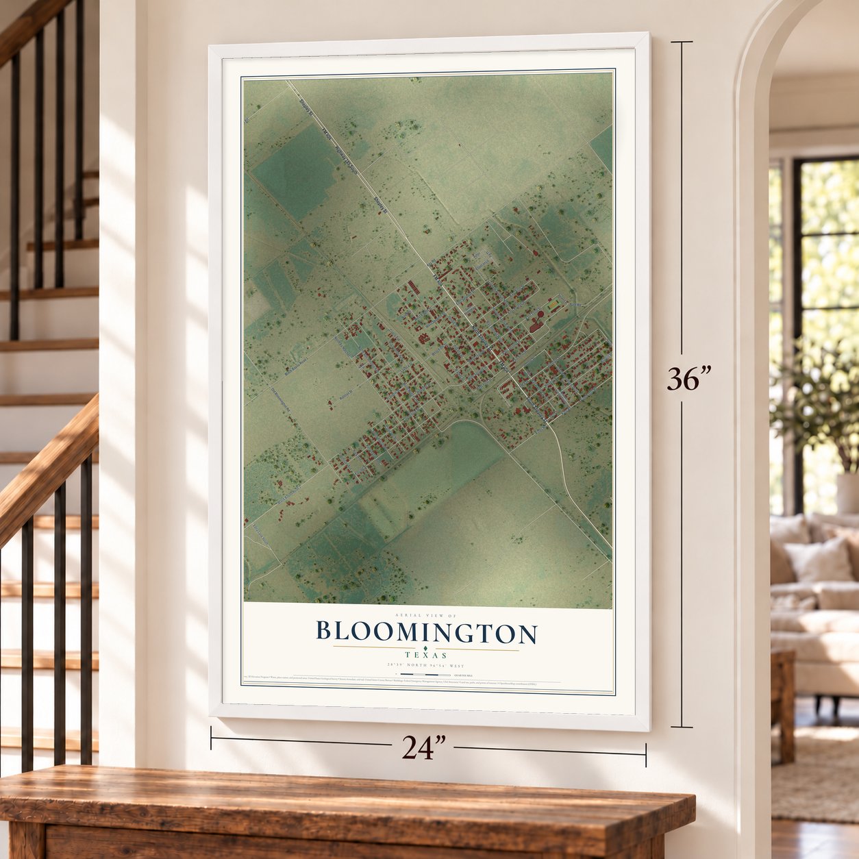 Bloomington, Texas map, 24 x 36 inch print in a white frame by a staircase