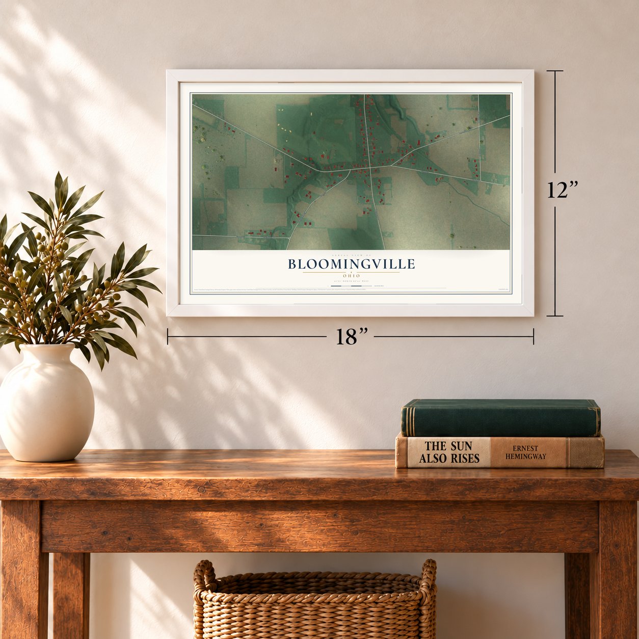 Bloomingville, Ohio map, 12 x 18 inch print in a white frame in an entryway
