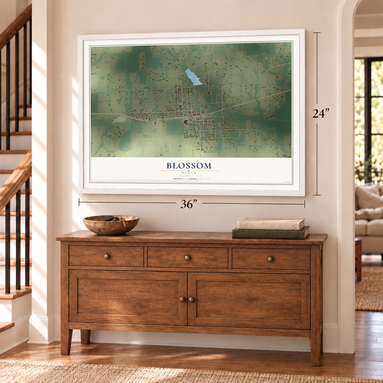 Blossom, Texas map, 24 x 36 inch print in a white frame above a dresser by a staircase