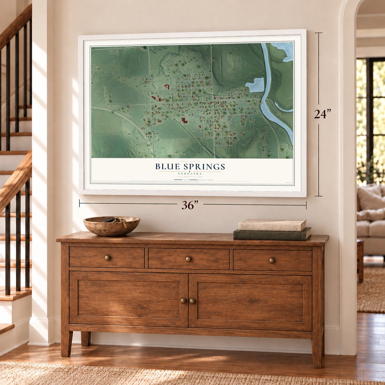 Blue Springs, Nebraska map, 24 x 36 inch print in a white frame above a dresser by a staircase
