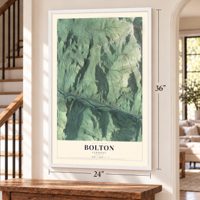 Bolton, Vermont map, 24 x 36 inch print in a white frame by a staircase