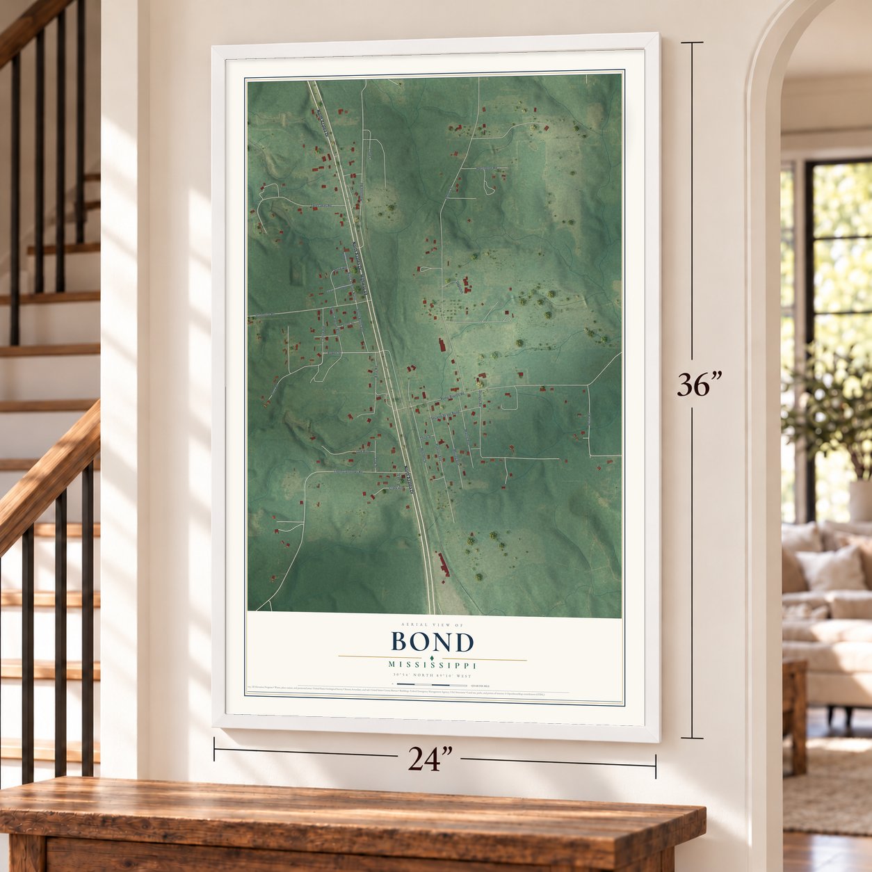 Bond, Mississippi map, 24 x 36 inch print in a white frame by a staircase