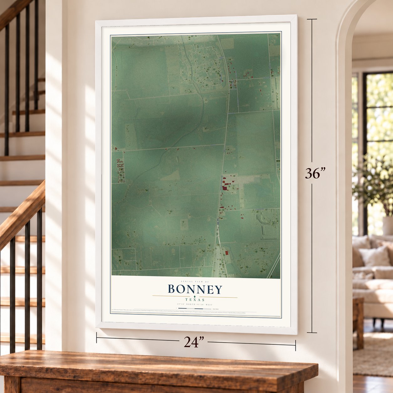 Bonney, Texas map, 24 x 36 inch print in a white frame by a staircase