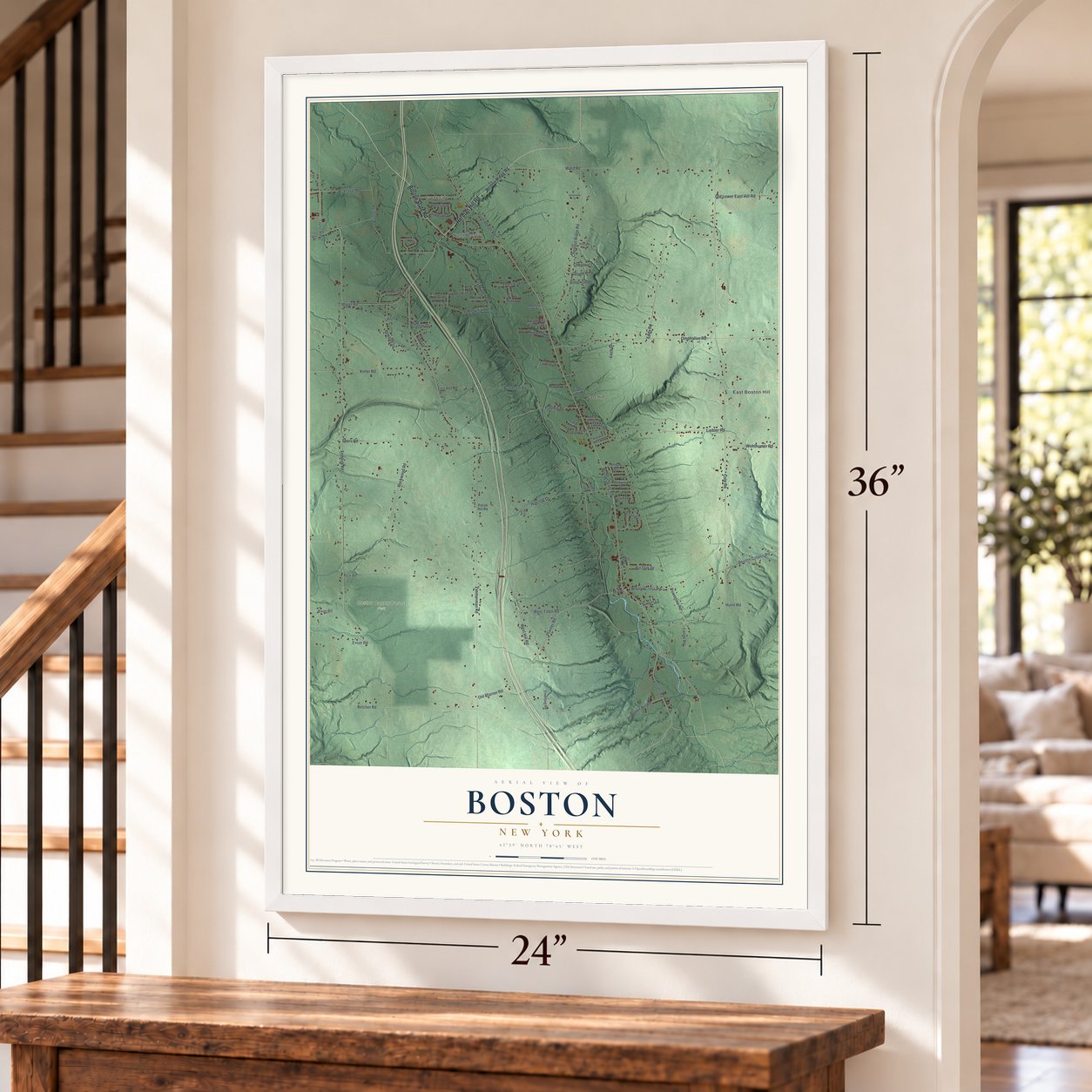 Boston, New York map, 24 x 36 inch print in a white frame by a staircase