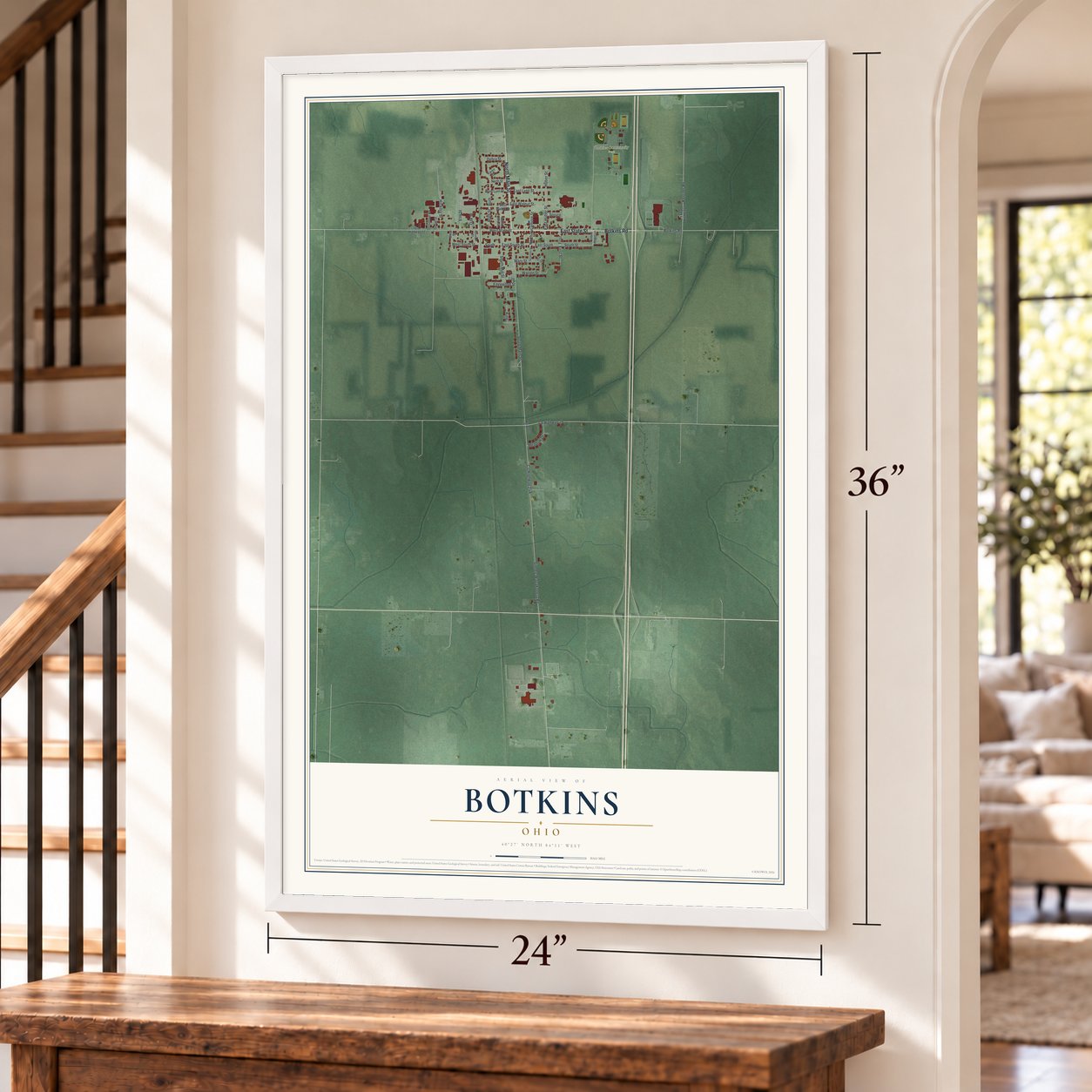 Botkins, Ohio map, 24 x 36 inch print in a white frame by a staircase