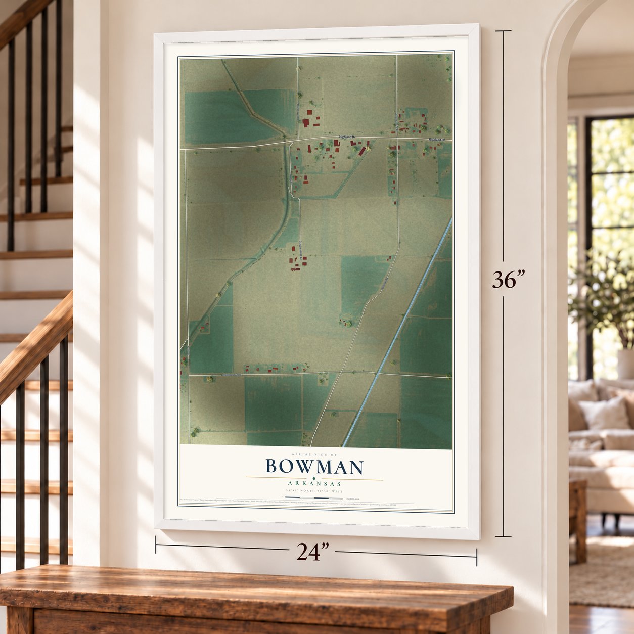 Bowman, Arkansas map, 24 x 36 inch print in a white frame by a staircase
