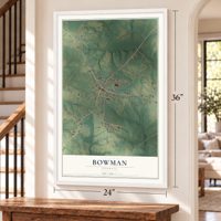 Bowman, Georgia map, 24 x 36 inch print in a white frame by a staircase