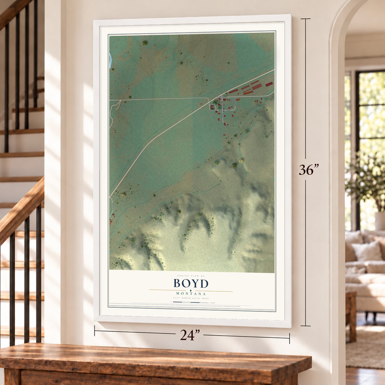 Boyd, Montana map, 24 x 36 inch print in a white frame by a staircase