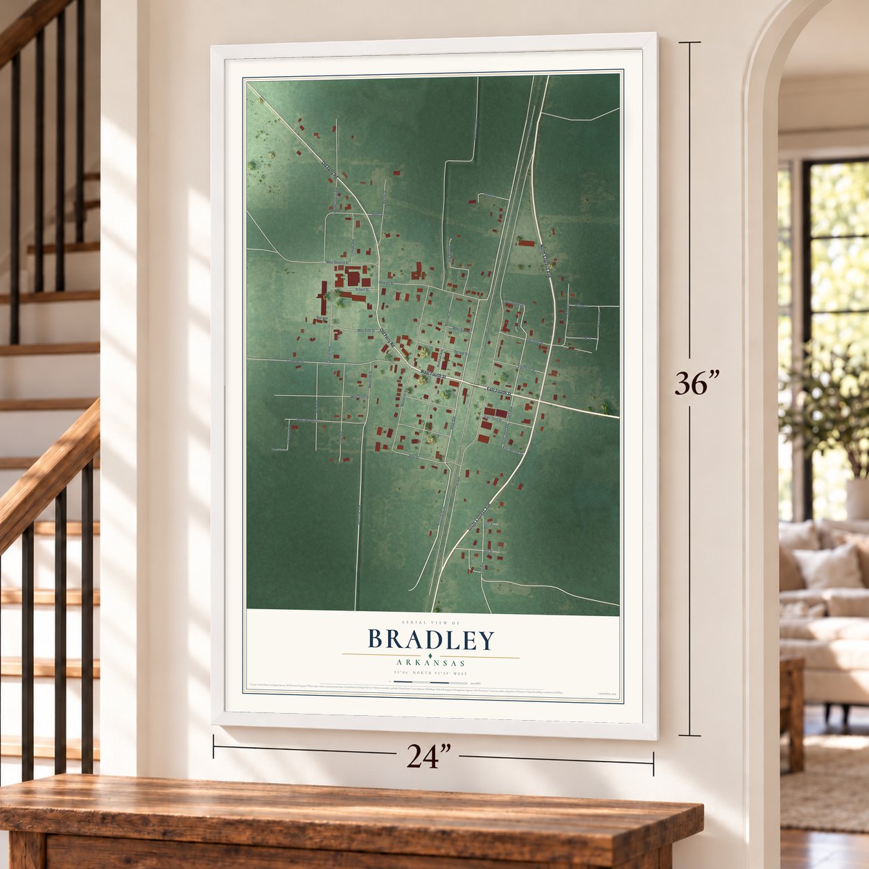 Bradley, Arkansas map, 24 x 36 inch print in a white frame by a staircase