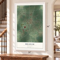 Braham, Minnesota map, 24 x 36 inch print in a white frame by a staircase