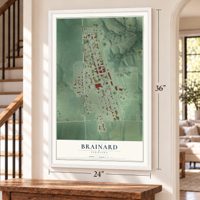 Brainard, Nebraska map, 24 x 36 inch print in a white frame by a staircase
