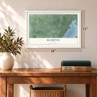 Brampton, Michigan map, 12 x 18 inch print in a white frame in an entryway