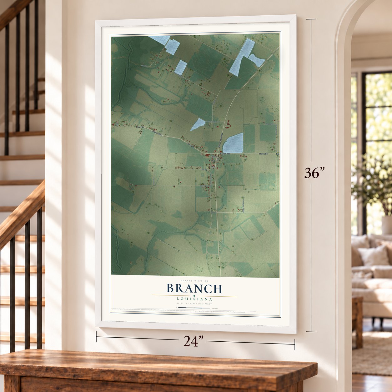 Branch, Louisiana map, 24 x 36 inch print in a white frame by a staircase
