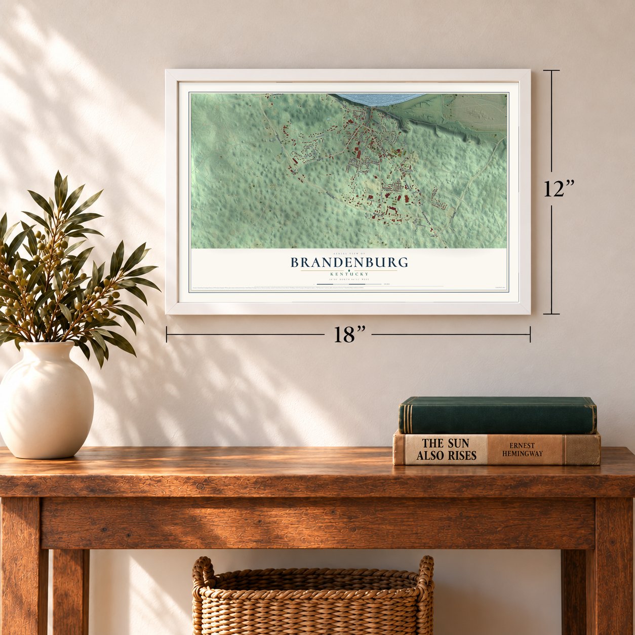 Brandenburg, Kentucky map, 12 x 18 inch print in a white frame in an entryway