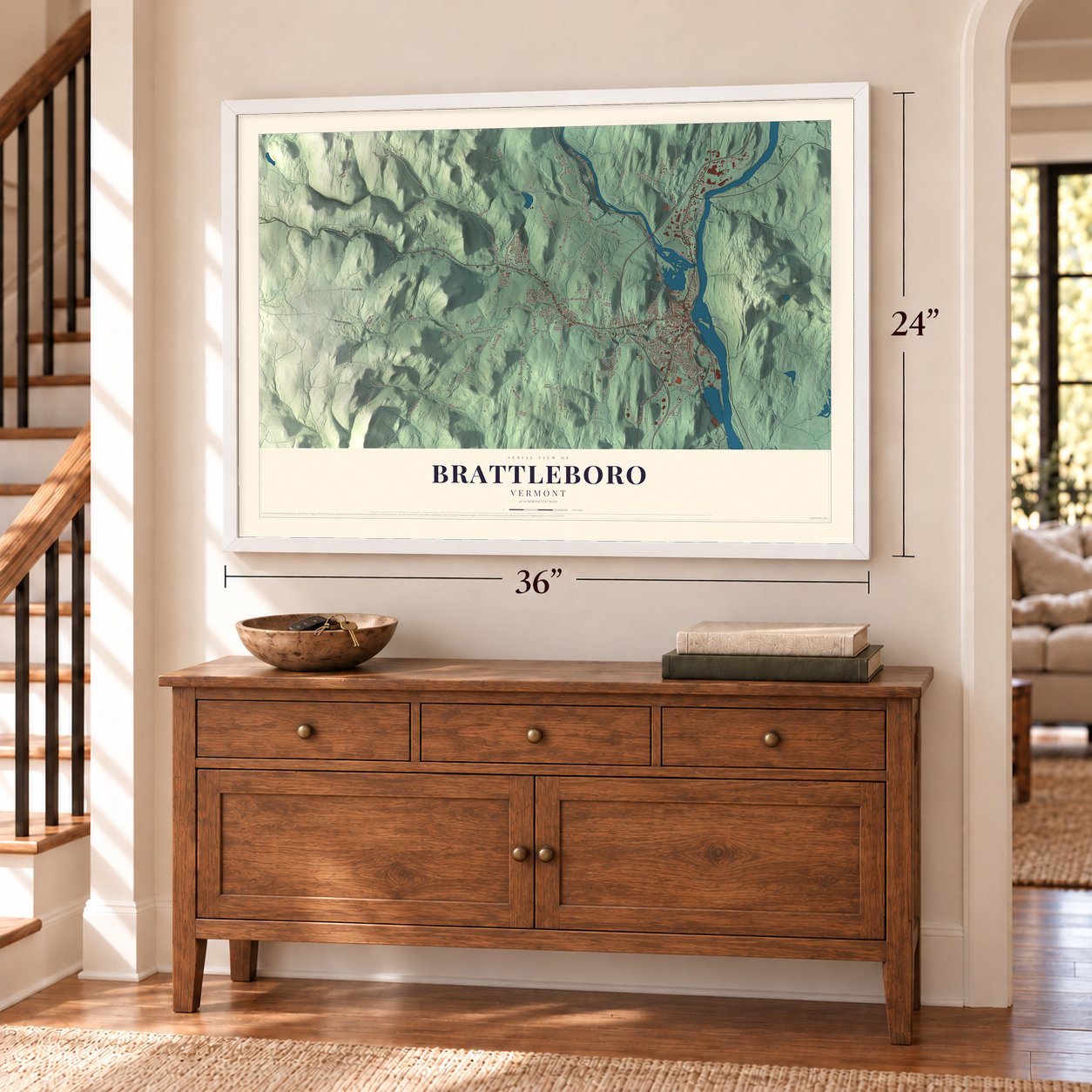 Brattleboro, Vermont map, 24 x 36 inch print in a white frame above a dresser by a staircase