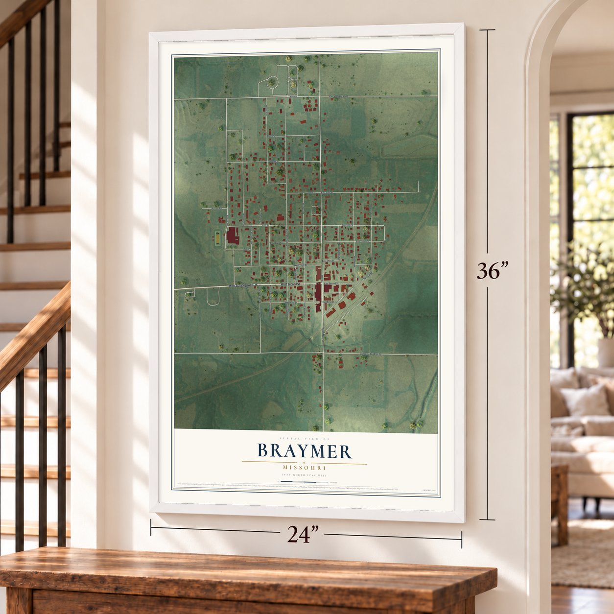 Braymer, Missouri map, 24 x 36 inch print in a white frame by a staircase
