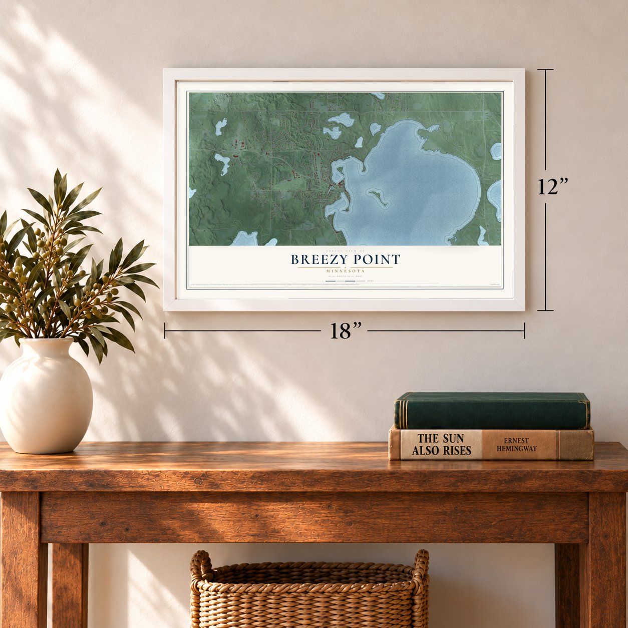 Breezy Point, Minnesota map, 12 x 18 inch print in a white frame in an entryway